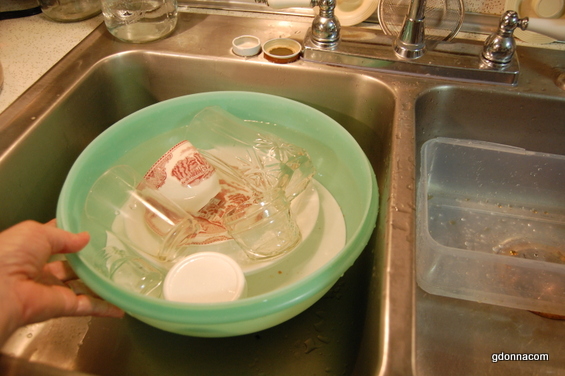 How to Save Water While Washing Dishes